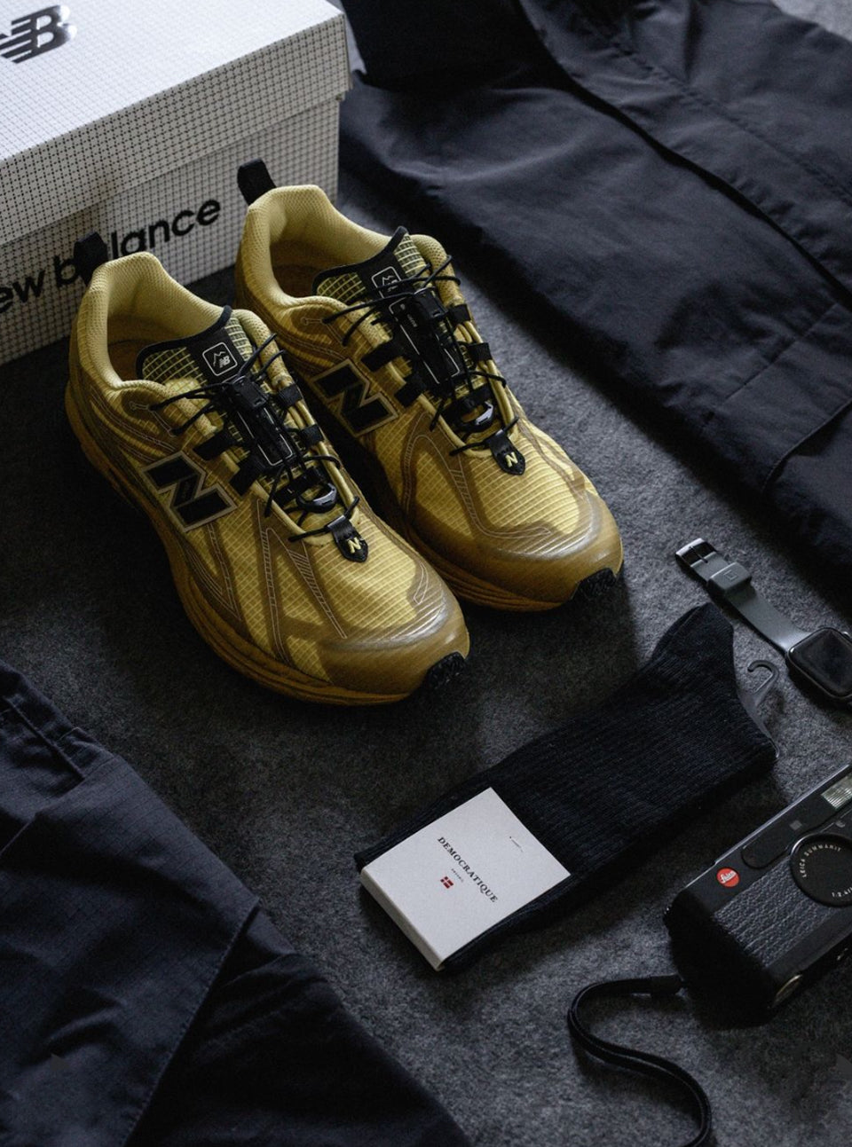 Democratique Socks black organic cotton socks worn with New Balance sneakers