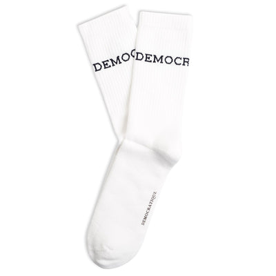 Clear white Athletique Classique sports socks with navy logo, product photo on white